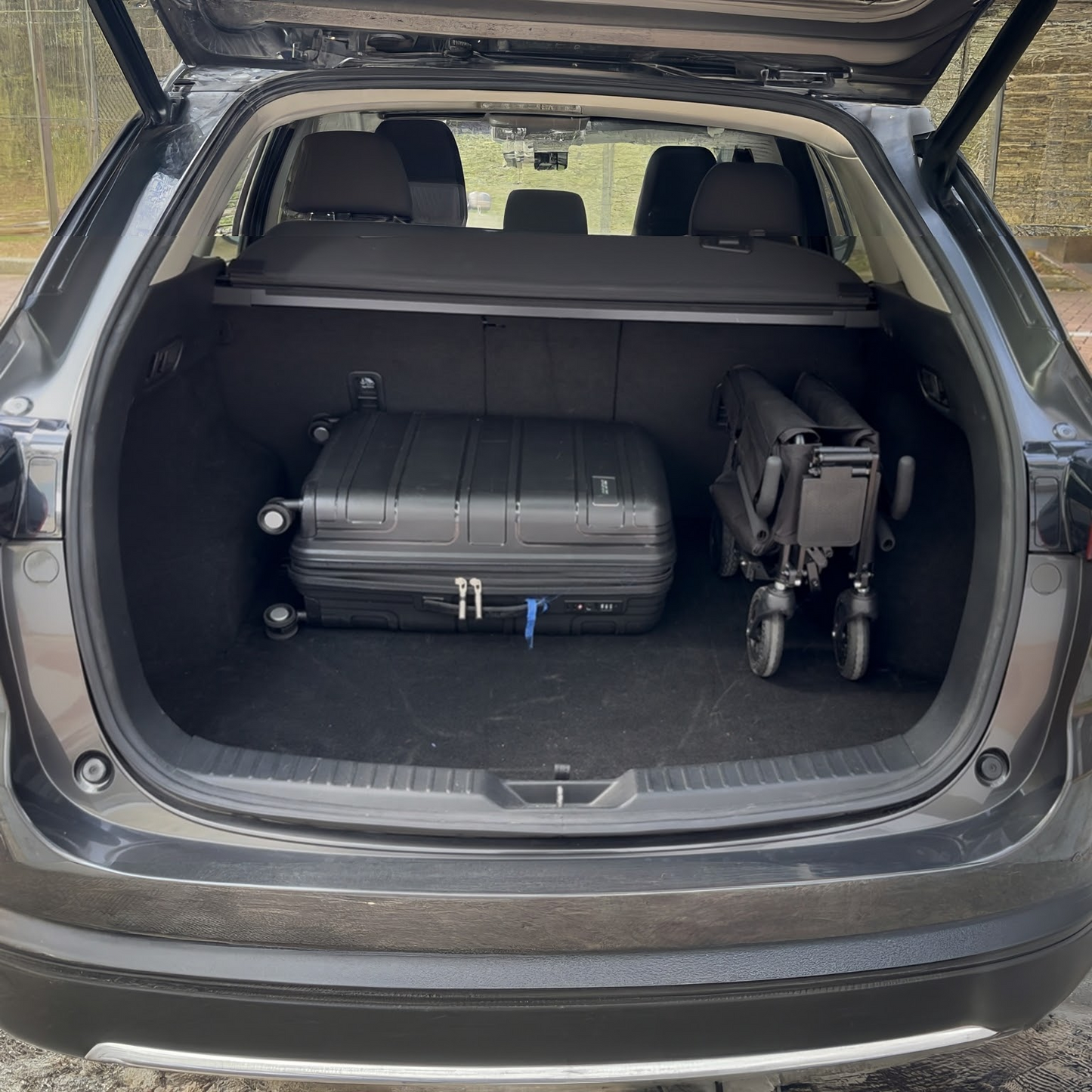 Travelier Electric Wheelchair in Car Trunk